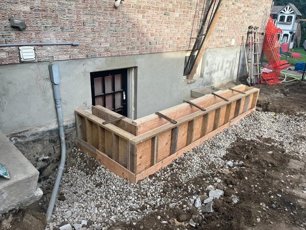 Poured concrete retaining wall by Master Decker in Southwestern Ontario