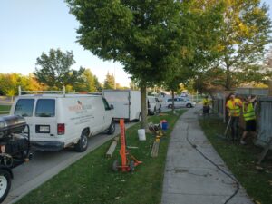 Master Decker Deck Cleaning and Repair Crews Working On A Fence