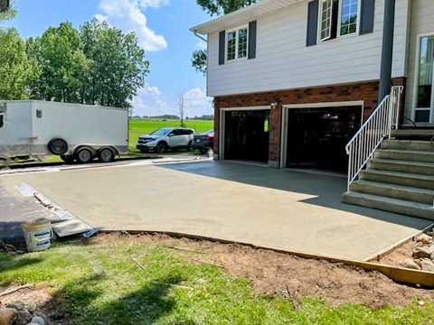 Concrete Driveway Photo of Natural Broom Finish Two Garage Driveway