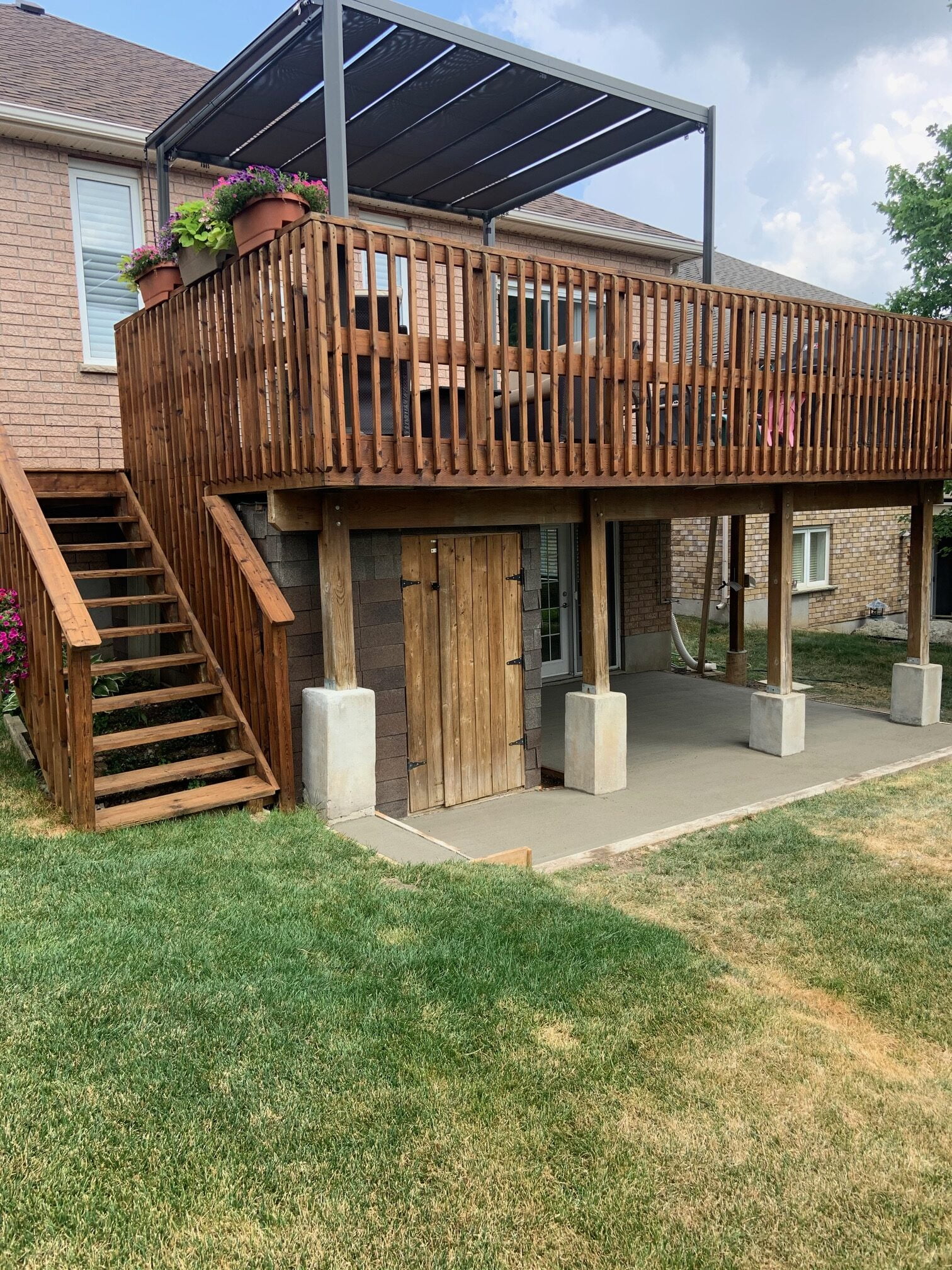 Natural Broom Finish Concrete Patio with A New Deck 